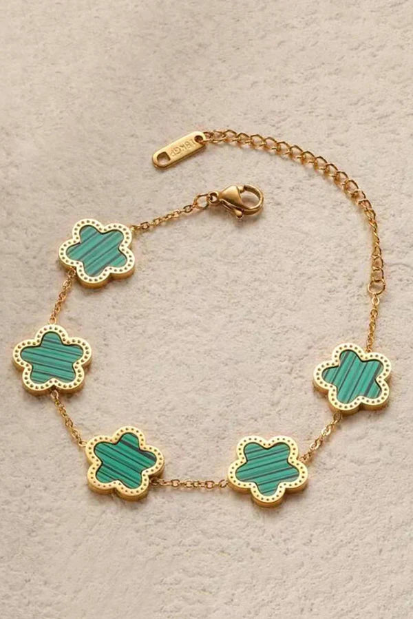 PULSERAS CON FORMA DE FLOR  EN ORO