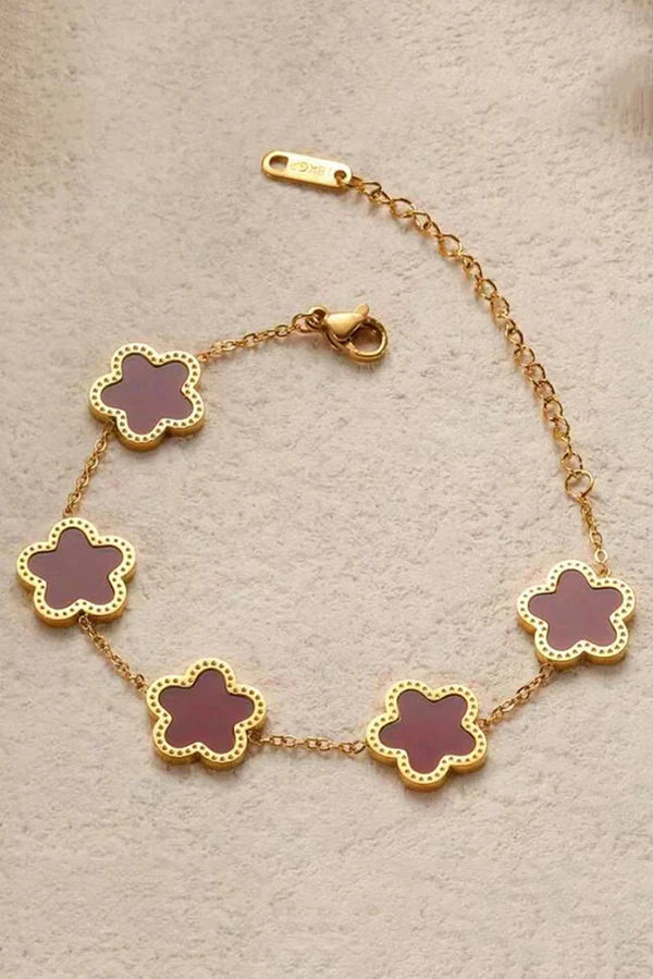 PULSERAS CON FORMA DE FLOR  EN ORO