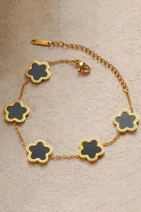 PULSERAS CON FORMA DE FLOR  EN ORO